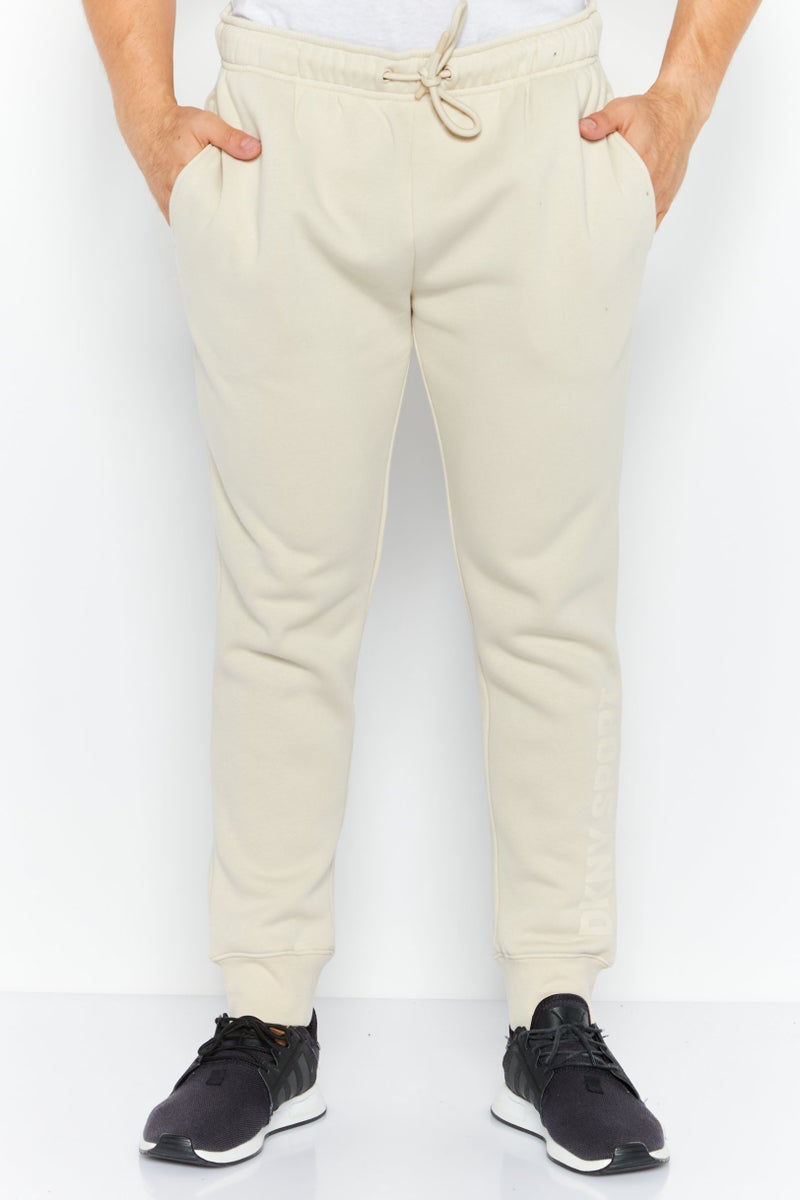 DKNY Sport سروال رياضي للرجال بشعار العلامة التجارية، لون الشوفان - Image 1