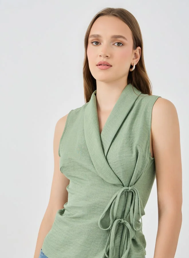 Styli Solid Sleeveless Wrap Top with Tie-Up Detail