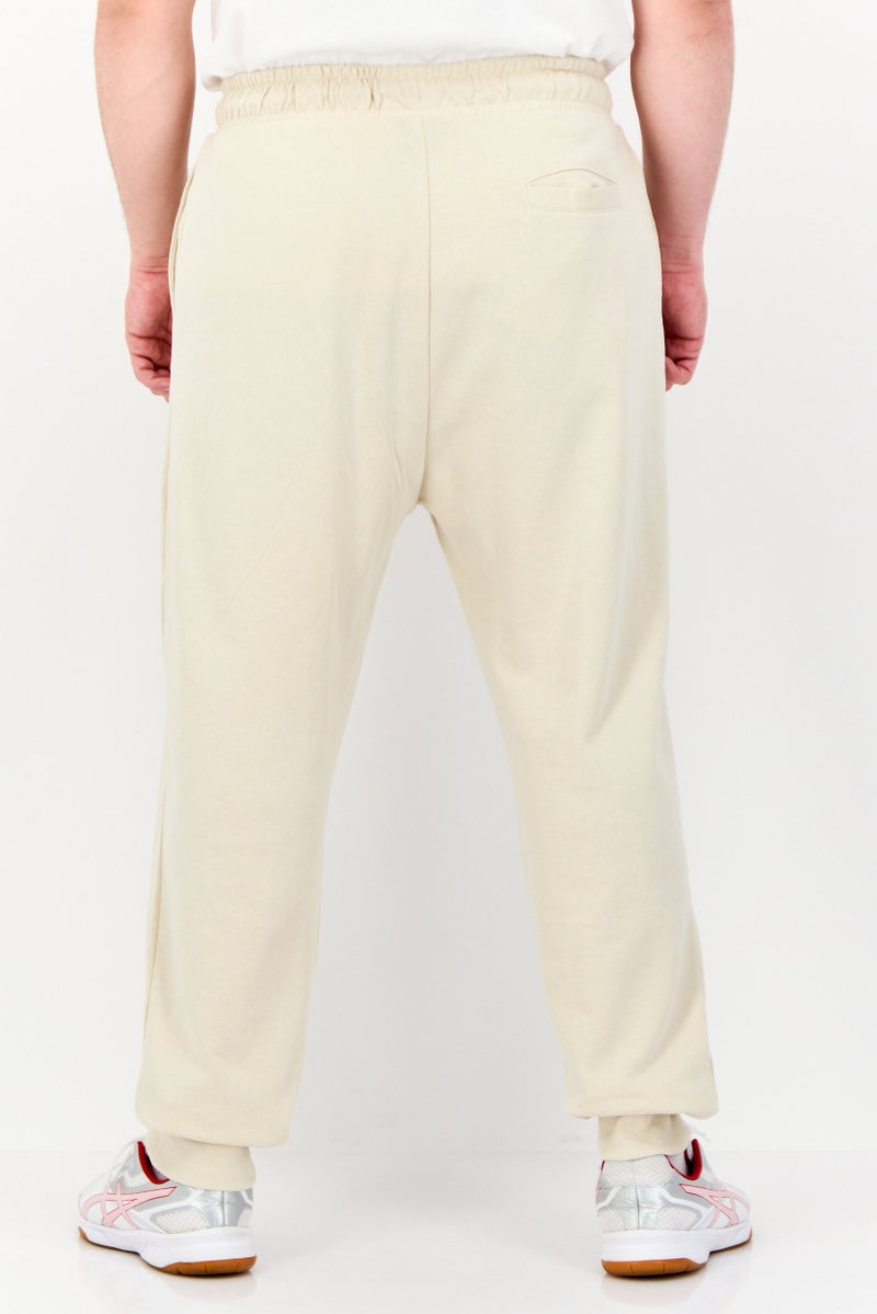 Paul Frank سروال رياضي للرجال بقصة عادية مع طباعة جرافيك، بيج - Image 2