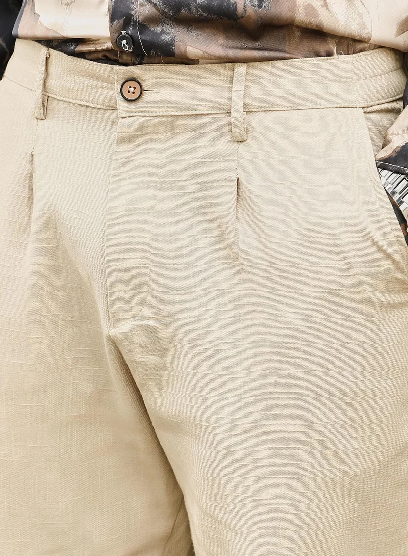 CAHOOT  Men's Off-White Pleated-Cuffed Tailored Trouers for Men | Best Price UAE