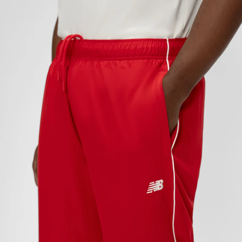 New Balance Apparel Team Red Men's Basketball Woven Pant for Men | Best Price UAE