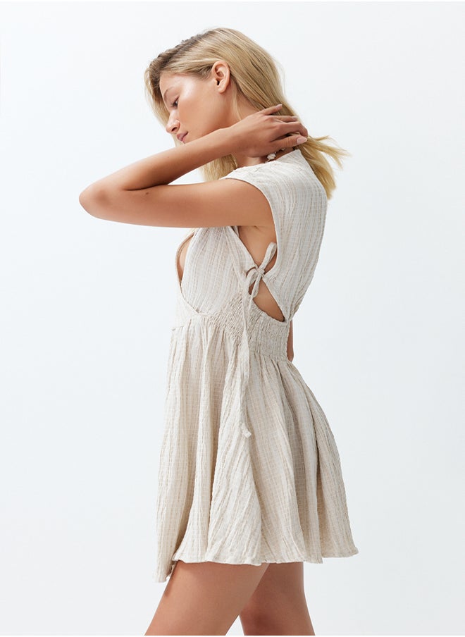 trendyol - Ecru Mini Woven Cut Out/Window Linen Blend Beach Dress TBESS24EL00075 - Image 1