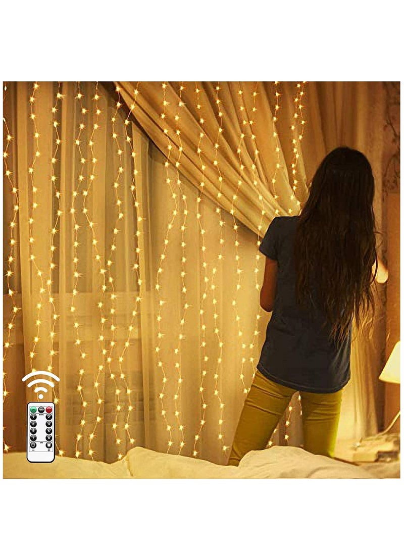 KASTWAVE Fairy String Lights, Warm White 300 LED, 9.8x9.8 Feet, Hanging Light for Bedroom Wall, Home Decor Lighting, Lighted Bed Room Curtain, Party Wedding Decorations Backdrop - Image 1