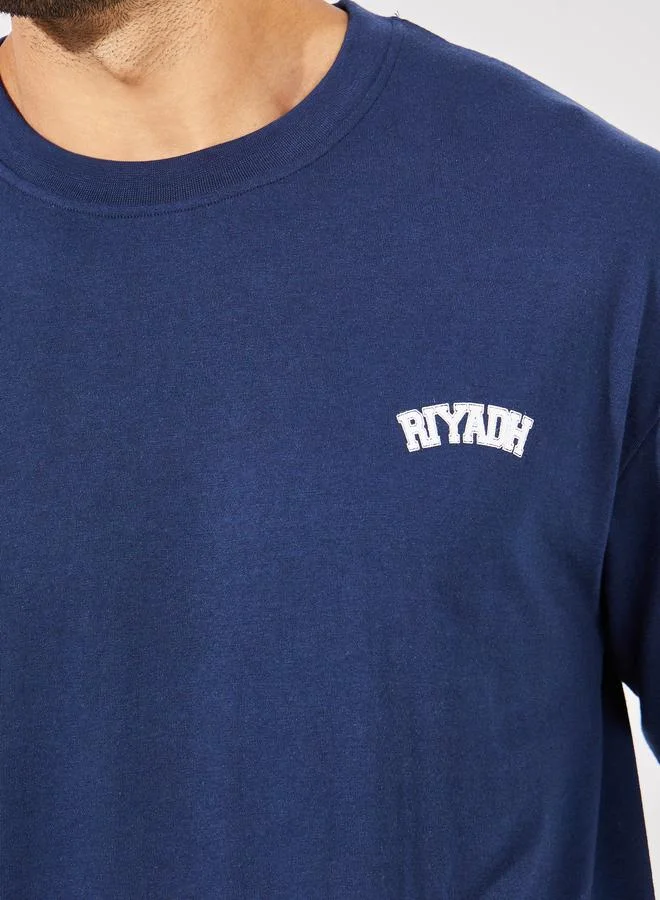 Styli Streetwear Back Varsity Print Oversized T-Shirt
