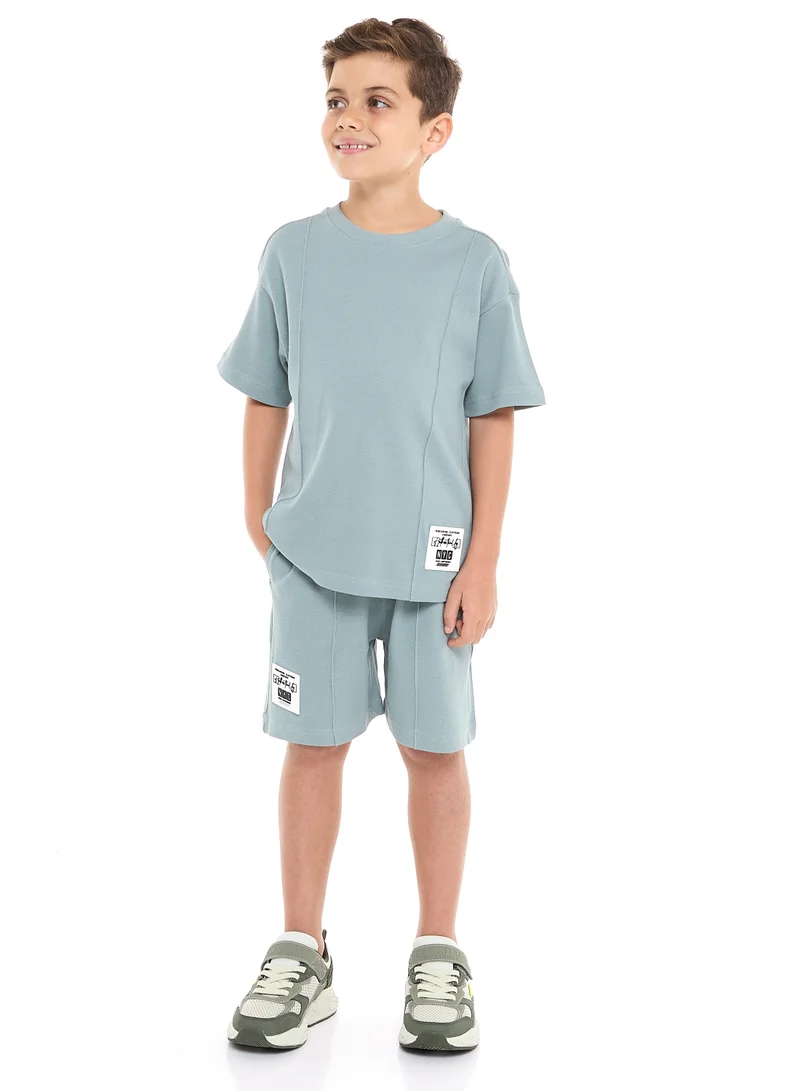 victor and jane Oversized - Boys' Jacquard 2-Piece Set - T-Shirt with Badge Detail and matching Shorts with Pockets