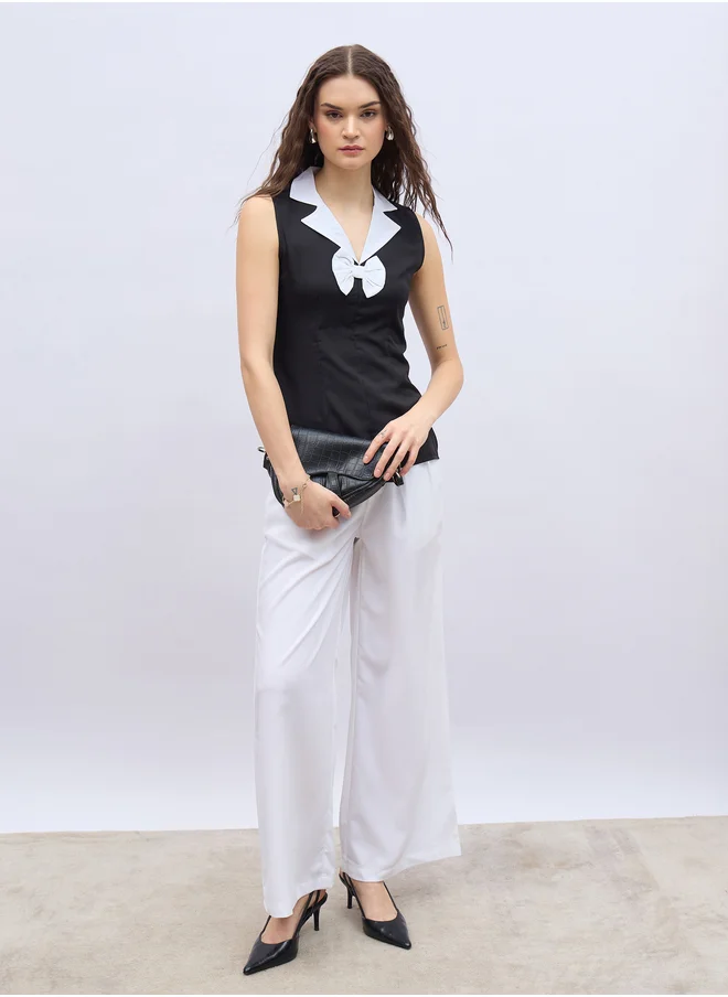 ستايلي Contrast Notch Lapel Sleeveless Top with Bow Detail