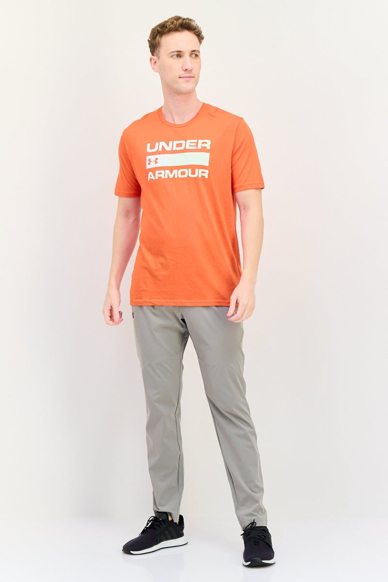 UNDER ARMOUR تي شيرت رجالي فضفاض بأكمام قصيرة للخارج، كورال - Image 2