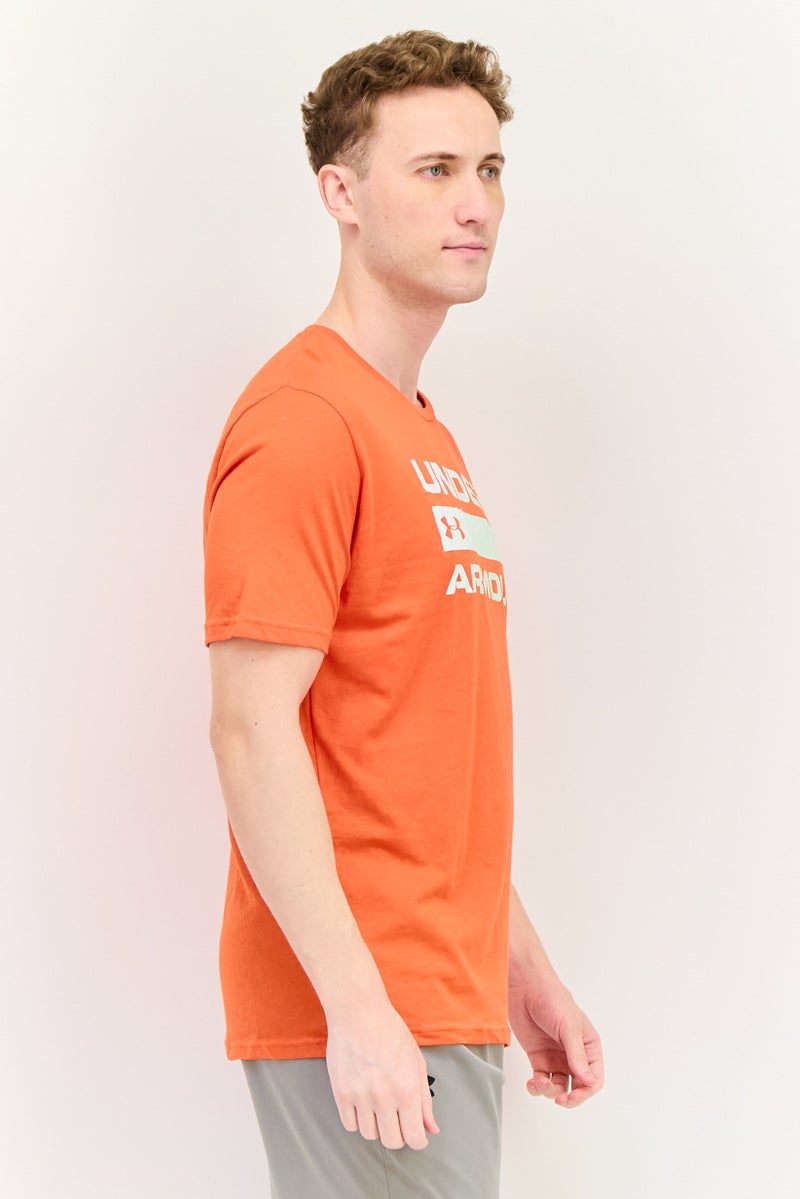 UNDER ARMOUR تي شيرت رجالي فضفاض بأكمام قصيرة للخارج، كورال - Image 3
