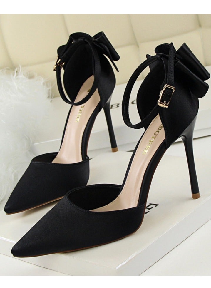 بيج تري Women's Closed Pointed Toe 10 CM High Heels with Bow Knot Ankle Strap Satin Stiletto Pumps Black - Image 1