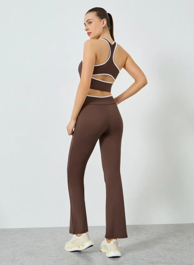 Styli Active  Contrast Edge Racerback Peep Sports Bra and Leggings Set for Women | Best Price UAE