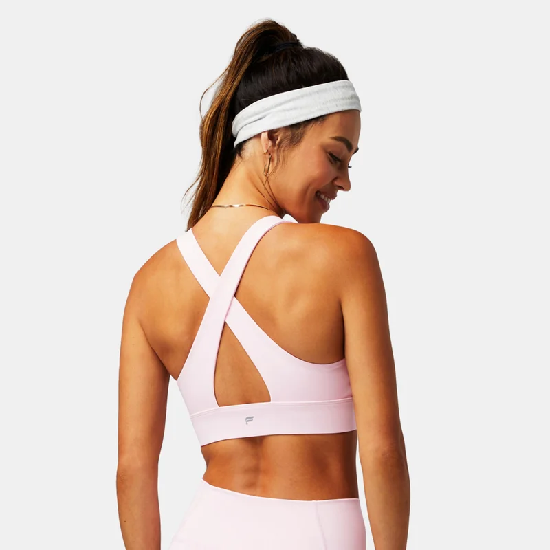 Fabletics صدرية رياضية للتدريب دعم متوسط اويسس تويست للنساء
