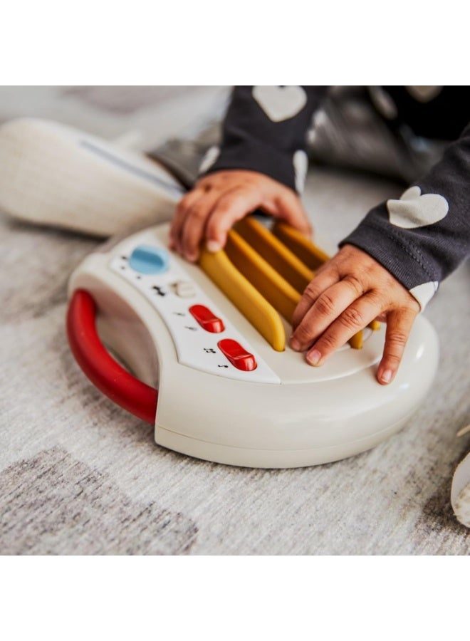 تيني لاف لعبة جيتار Tiny Love Rockers - مجموعة موسيقى الروك | آلة موسيقية إلكترونية للأطفال الصغار من عمر 12 شهرًا فما فوق | 8 ألحان وأصوات موسيقى الروك أند رول | تنمية المهارات الحركية الدقيقة وتحفيز حاسة السمع - Image 2