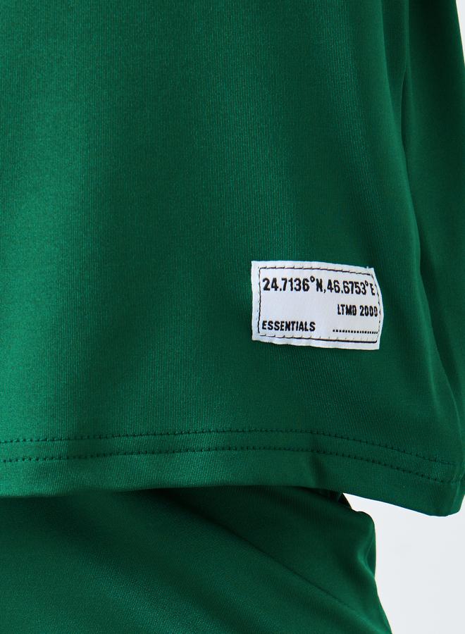 ستايلي طقم تي شيرت وبنطلون ليجن للبنات باللون الأخضر الداكن بشعار - Image 4