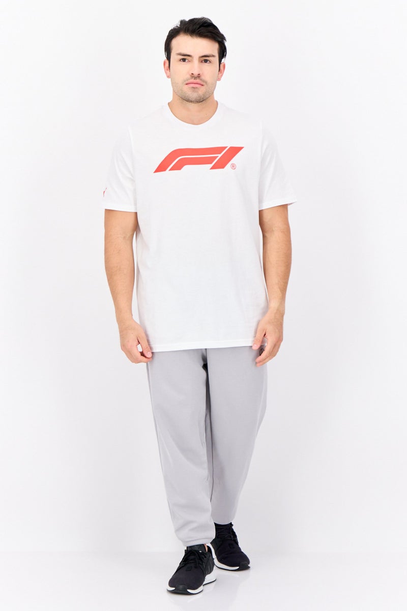 PUMA Men Sportswear Fit Short Sleeves F1 Motorsport Training T-Shirt, White/Red  - Image 3