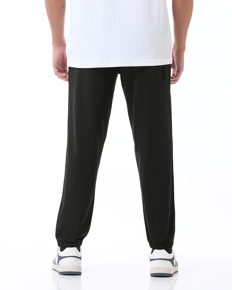 bewakoof  Men's Black Oversized Warm Joggers  | Best Price UAE