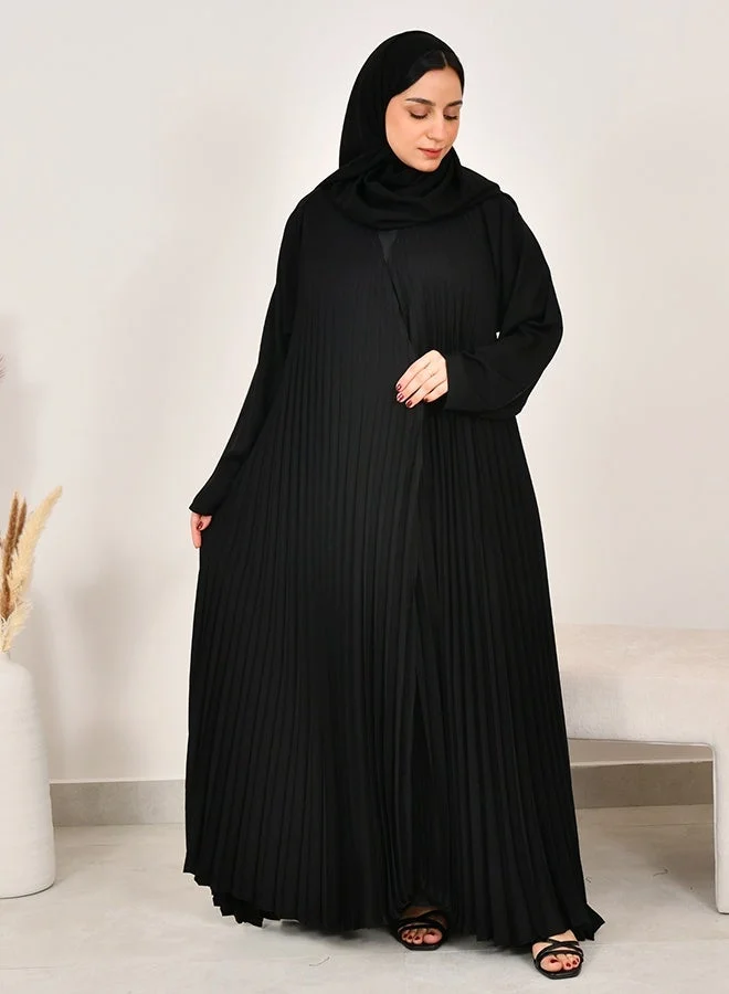 HAWRAA ABAYA Black semi-flared abaya made from crinkled fabric