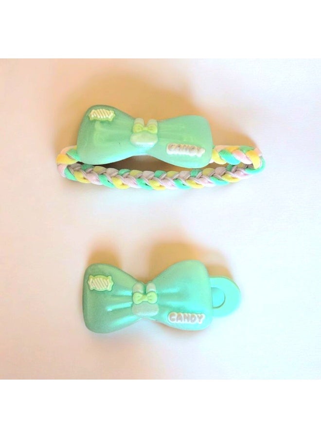 طقم مكون من مشبك و ربطة شعر علي شكل فيونكة للفتيات باللون الأخضر - Image 1