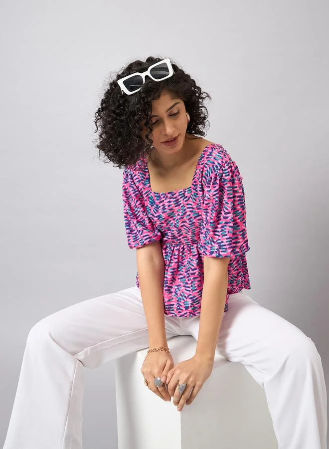 Kuwarii Multi Print Peplum Top with Back-Tie