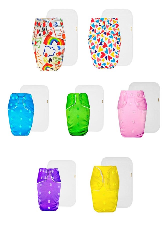 حفاضات دمبلدو القماشية الممتازة مع حشوة قطنية (عبوة من 7) | شعور بالجفاف والراحة | مانعة للتسرب | أزرار كبس قابلة للتعديل | مناسبة للارتداء طوال اليوم | من 3 أشهر إلى 3 سنوات | للجنسين - Image 1
