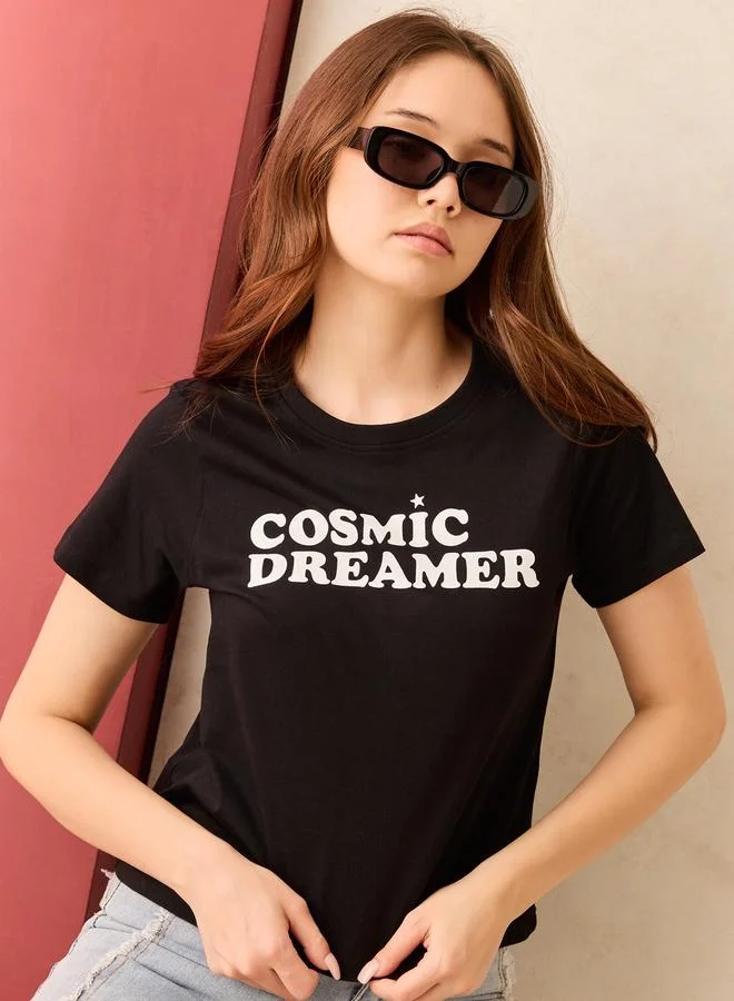 Outzidr  Black Graphic Crew Neck T-Shirt - 100% Cotton for Women | Best Price UAE