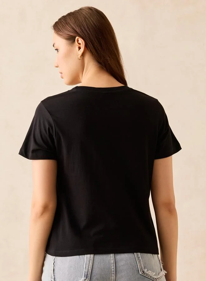 Outzidr  Black Graphic Crew Neck T-Shirt - 100% Cotton for Women | Best Price UAE