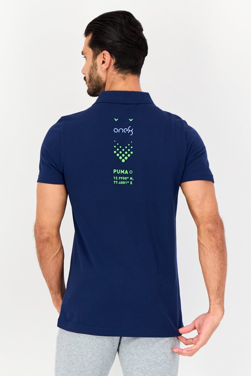 PUMA قميص بولو قصير الأكمام للرجال من One8 بتصميم ضيق مع شعار العلامة التجارية، أزرق داكن - Image 3