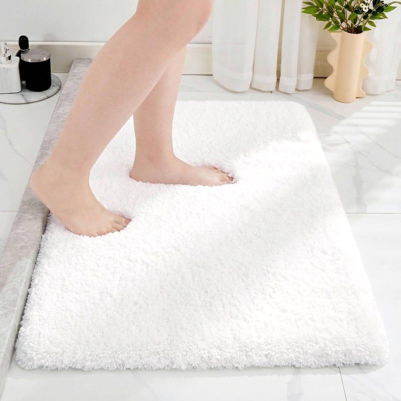Disolla White Bathroom Rug 20x32 - Non-Slip Plush Thick Bath Mat, Highly Absorbent & Ultra Soft Fluffy Floor Mat, Machine Washable for Shower and Tub - Image 1