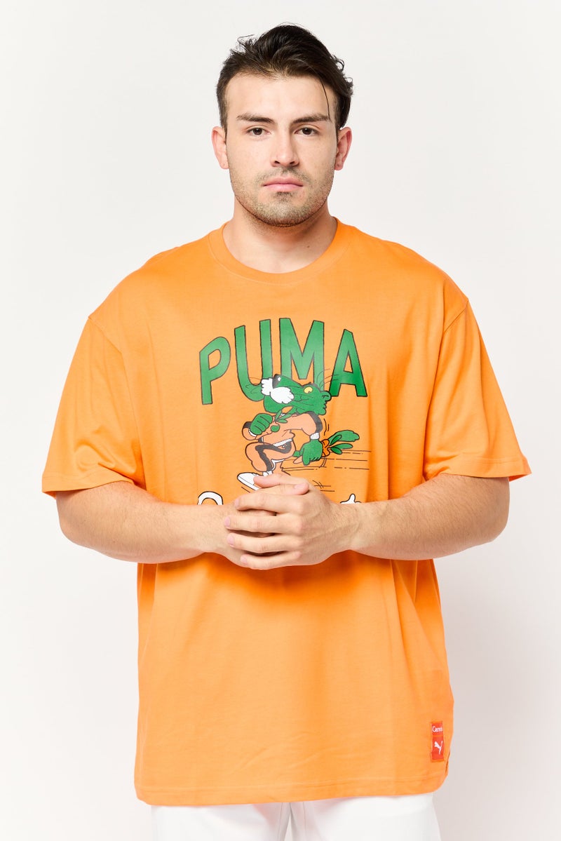Puma x Carrots Men Sportswear Fit Short Sleeve Outdoor T-Shirt, Orange - Image 1