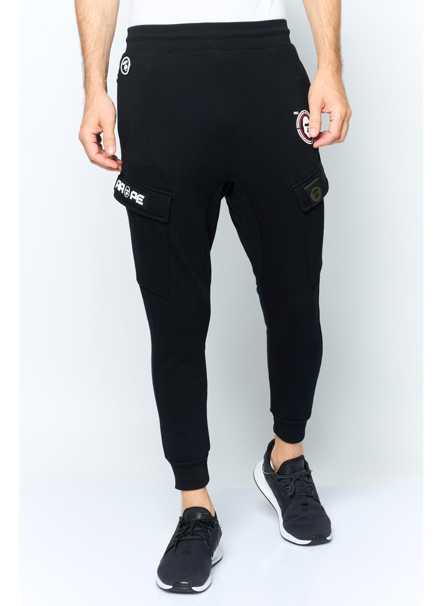 Aape By A Bathing Ape - Men Jogger Fit Graphic Print Cargo Pants, Black - Image 1