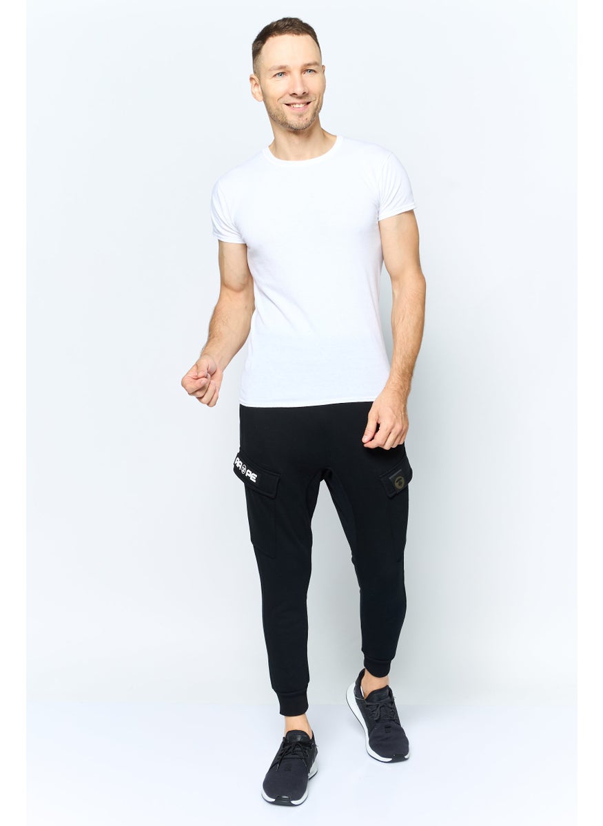 Aape By A Bathing Ape - Men Jogger Fit Graphic Print Cargo Pants, Black - Image 1