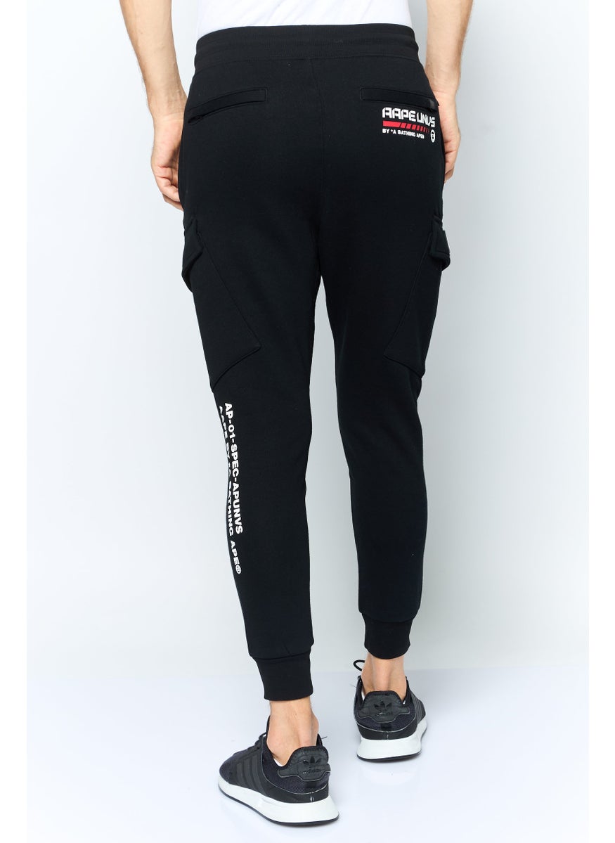 Aape By A Bathing Ape - Men Jogger Fit Graphic Print Cargo Pants, Black - Image 1