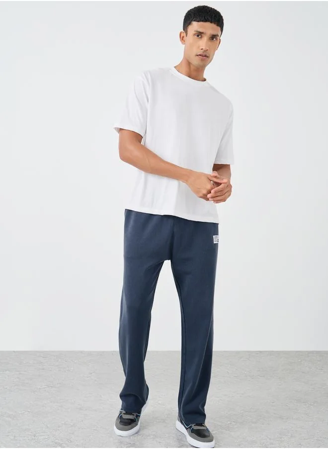 ستايلي Styli Badge Detail Oversize Joggers with Drawstring
