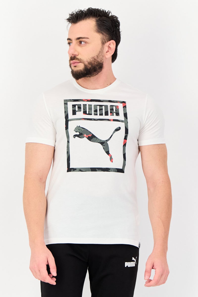 PUMA Men Sportswear Fit Short Sleeves Brand Logo Outdoor T-Shirt, White - Image 1