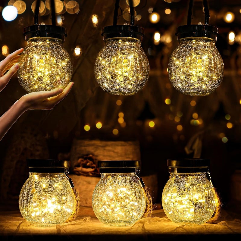 عبوة من 4 مصابيح شمسية من نوع Cooo مصنوعة من زجاج متشقق، مزودة بـ 30 مصباح LED على شكل ضوء اليراعة – مصباح معلق مقاوم للماء للاستخدام في الهواء الطلق؛ تحتوي هذه المصابيح على لوحة شمسية أكبر بنسبة 215%، وغطاء مصنوع من الفولاذ المقاوم للصدأ، وتُستخدم كإضاءة زخرفية لطاولات الحدائق أو التراسات. - Image 1