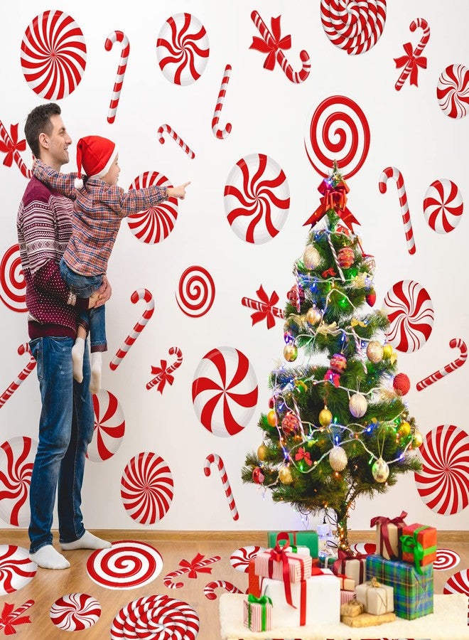وولاين مجموعة ملصقات جدارية لعيد الميلاد من والين، 30 قطعة، باللونين الأحمر والأبيض، ملصقات أرضية على شكل حلوى بأحجام متنوعة، ورق جدران مطبوع عليه عصا حلوى النعناع، مقاوم للماء، ملصقات نوافذ مزدوجة الجوانب، مثالية لتزيين حفلات عيد الميلاد. - Image 4