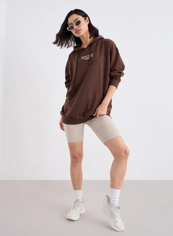 Styli Oversized Longline Slogan Print Hoodie