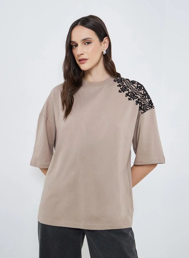 Women Beige Placement Flocked Oversized T-Shirt