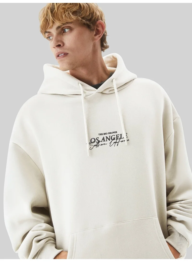 Maniac Mens Printed Hooded Neck Full Sleeve Cream Cotton Sweatshirt