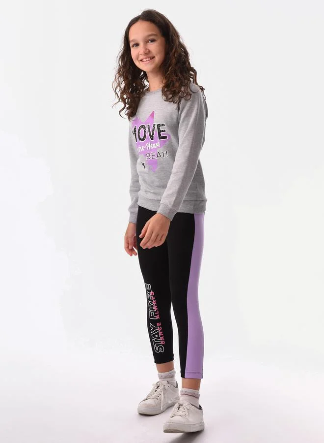 URBASY Graphic Printed Sweatshirt & Side Stripe Leggings Set by Styli