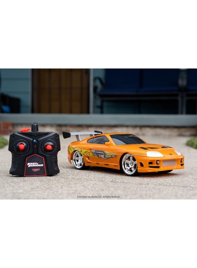 Jada Toys Fast & Furious RC 1995 Toyota Supra Vehicle (1/16 Scale), Orange, Standard, 97582 - Image 2