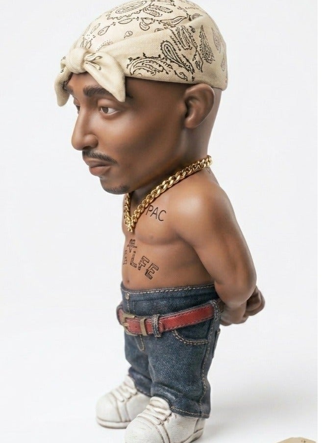 A commemorative art sculpture depicting the legendary rapper Tupac Shakur (2Pac) in a realistic and detailed design. - Image 1