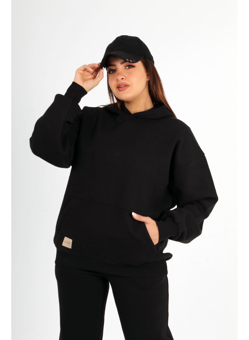 سويت شيرت للنساء والبنات هودي اوفر سايز أسود 2 جيب وطبعه مميزة جدا - خامه قطن 100% ( ميلتون ) - مناسب لكل الأوقات صباحاً أو مساءً وجميع الخروجات ( العمل .الكلية .الچيم .خروجة  مع الاصدقاء ) وتدفئه من بروده الشناء - تنسيقه مع أي بنطلون رياضي أو جينز - Image 1