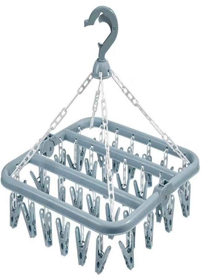 alladaga Clothes Drying Hanger with 32 Clips and Drip Foldable Hanging Rack (Light Blue) - Image 1