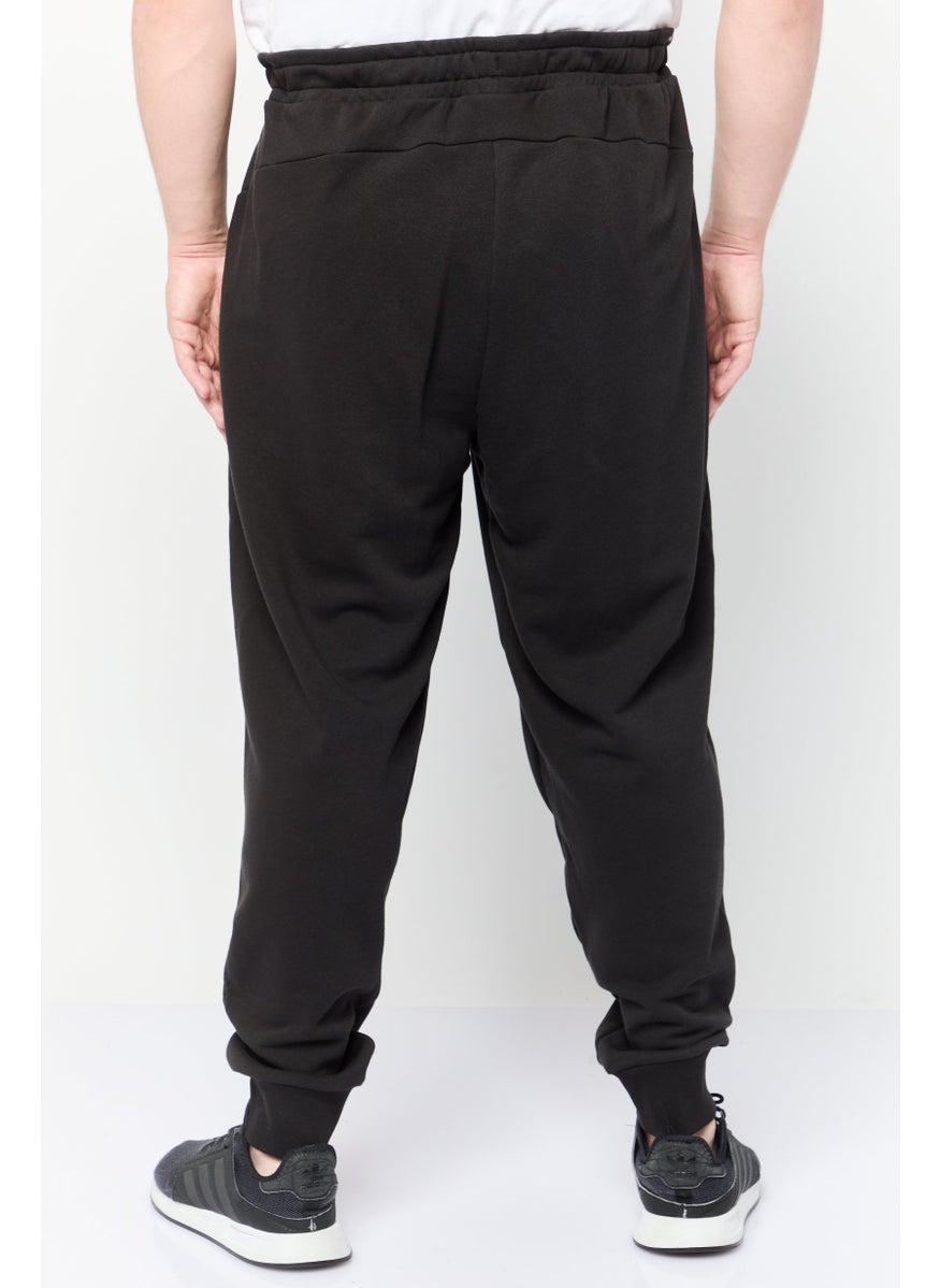 PUMA Men Sportswear Fit Outdoor Sweatpants, Black  - Image 4