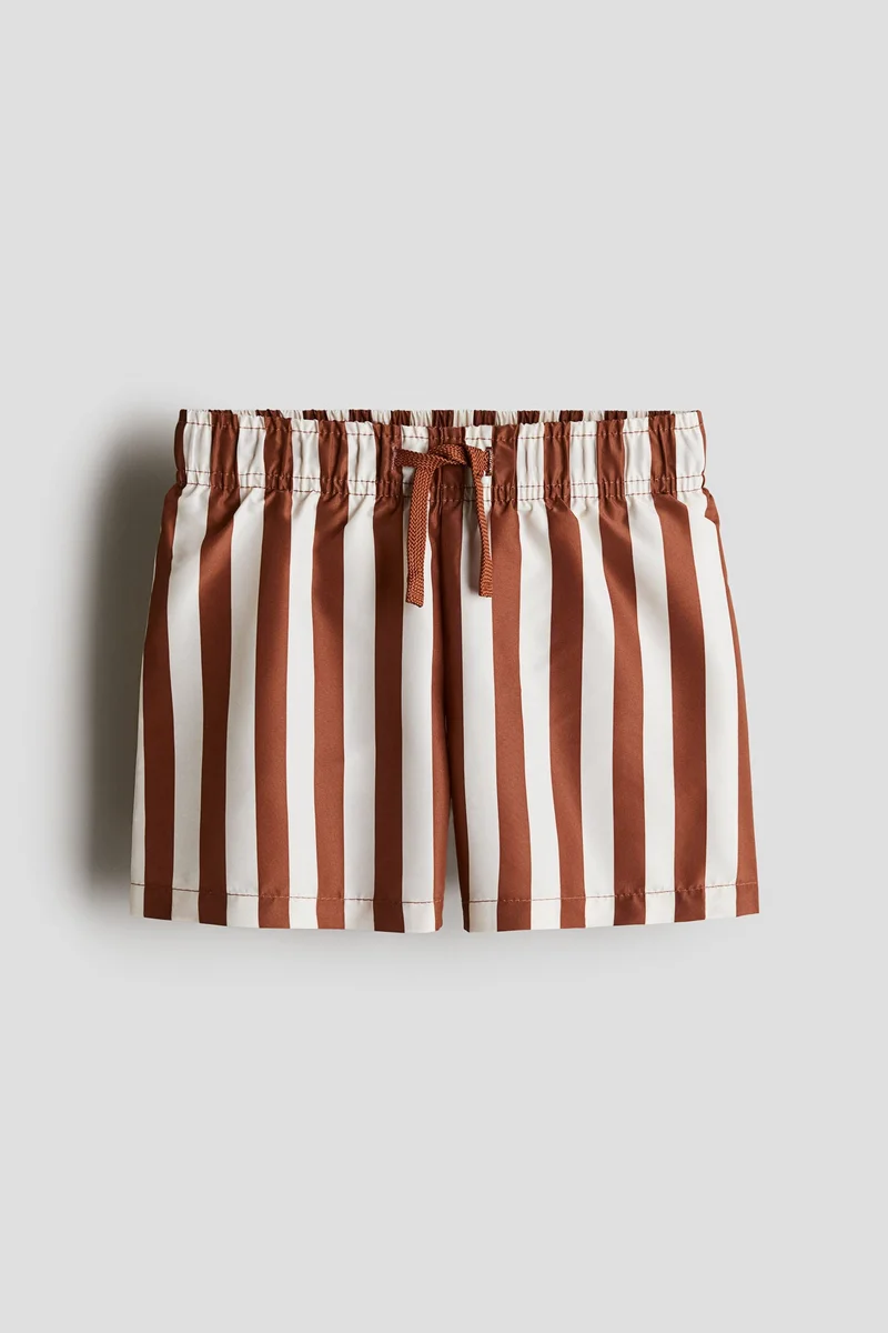 اتش اند ام شورت سباحة مزين بطبعة