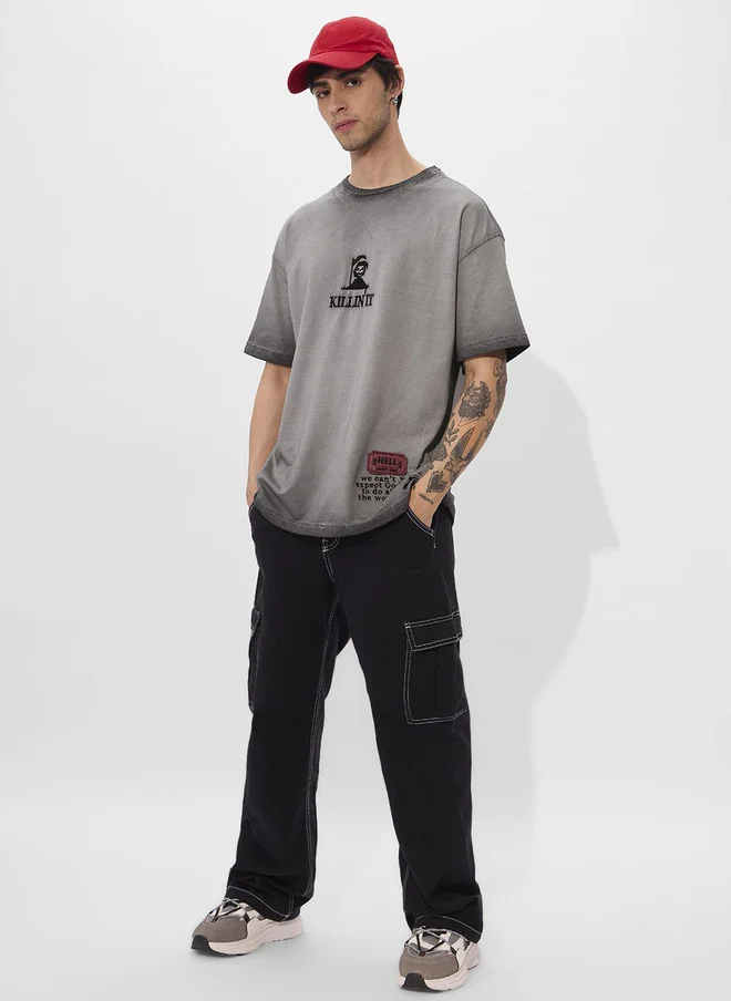 The Souled Store  The Souled Store Men's Oversized Grey Cotton T-Shirt with Graphic Print  | Best Price UAE