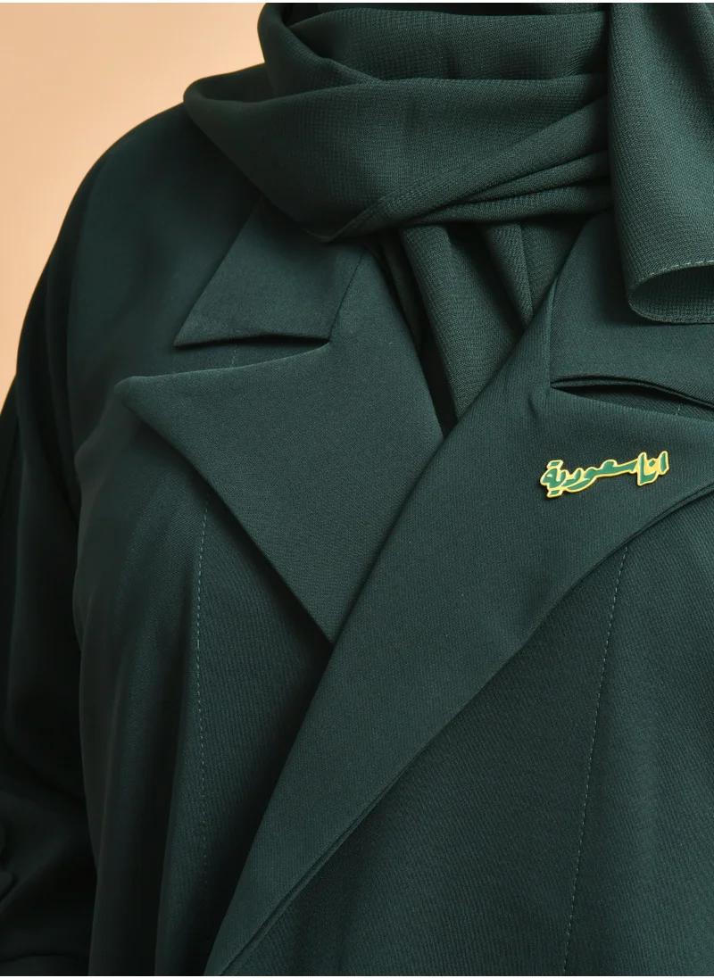 HAWRAA ABAYA Quarter cloche abaya in green with a blazer design and decorated with buttons