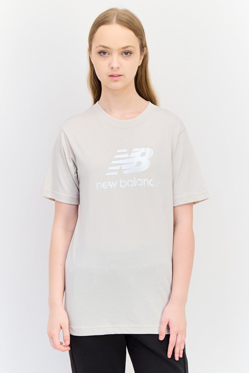 New Balance Women Relaxed Fit Short Sleeves Outdoor T-shirts, Beige - Image 1