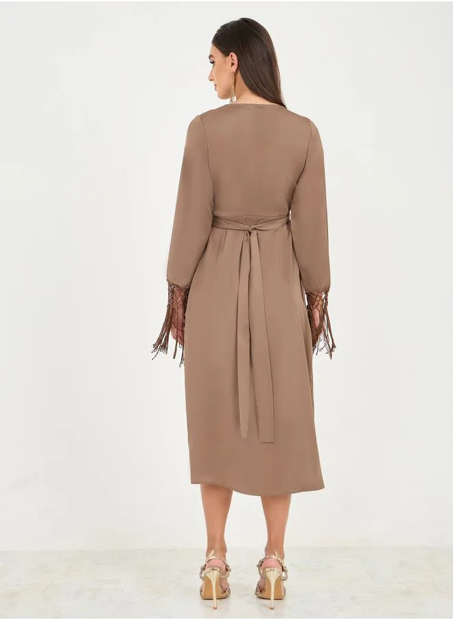 ستايلي Tassel Trim Sleeves Asymmetric Hem Wrap Midi Dress