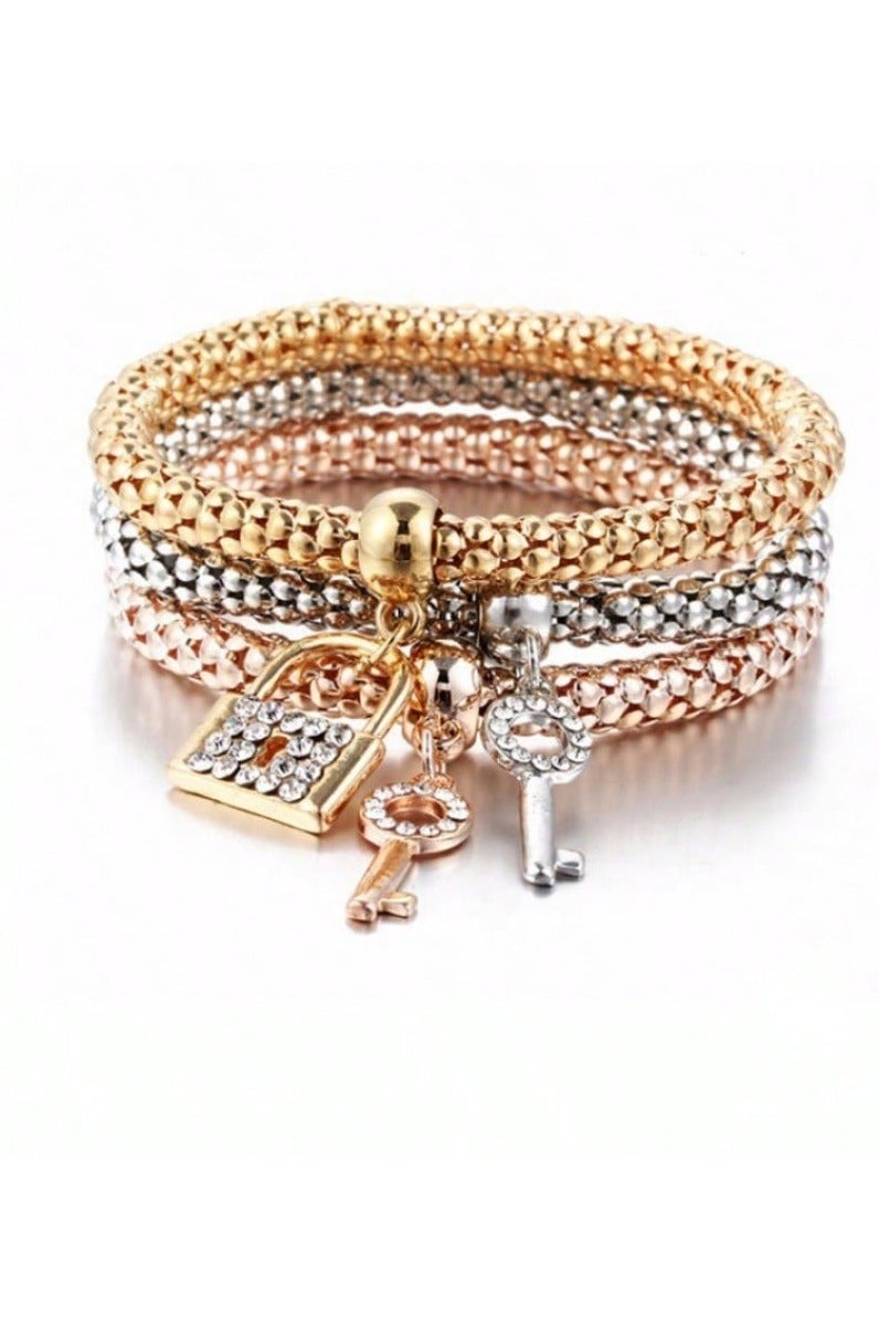 Women's accessory – a set of 3 bracelets in different colors with lock and key charms. Perfect as a gift for birthdays, graduations, Valentine's Day, and all special occasions.  - Image 1